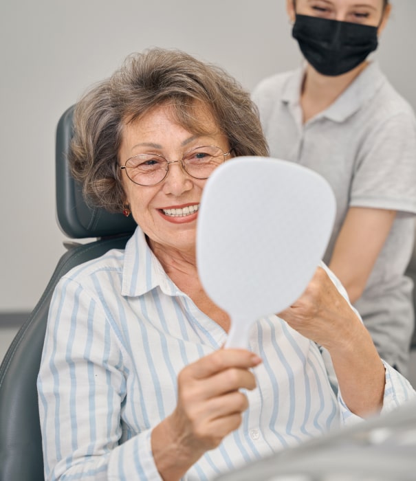 implant retained dentures benefits min