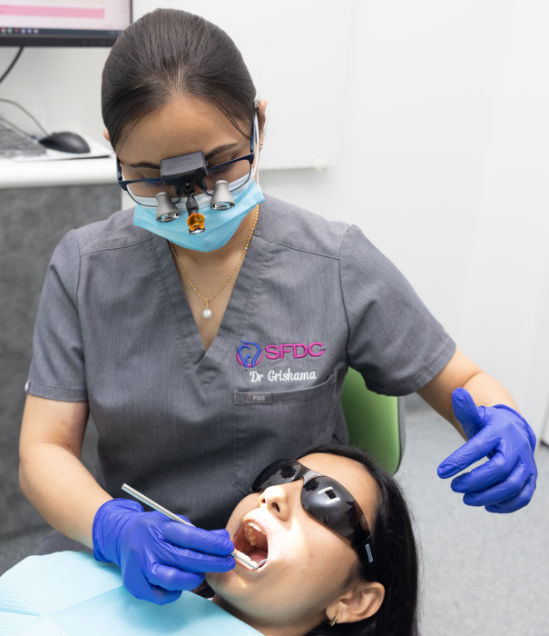 Dental checkup by dentist of SFDC